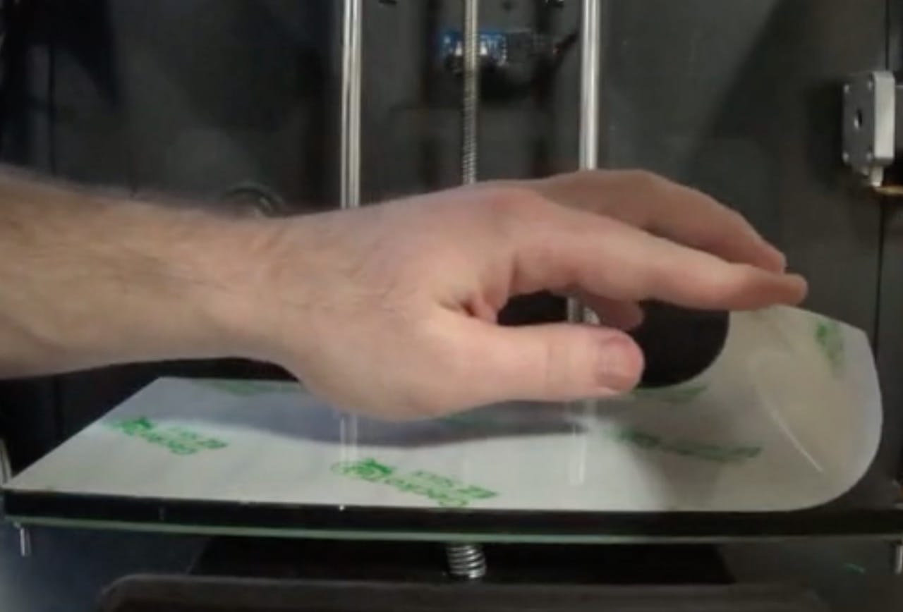  GeckoTek's EZ Stick 3D printing adhesion system is easy to apply: just roll it on and ensure it's flat 