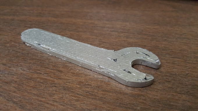  A sample 3D printed wrench in metal by the Ability1 3D metal printer. It's a bit coarse-looking, but there's a reason for that, see below 