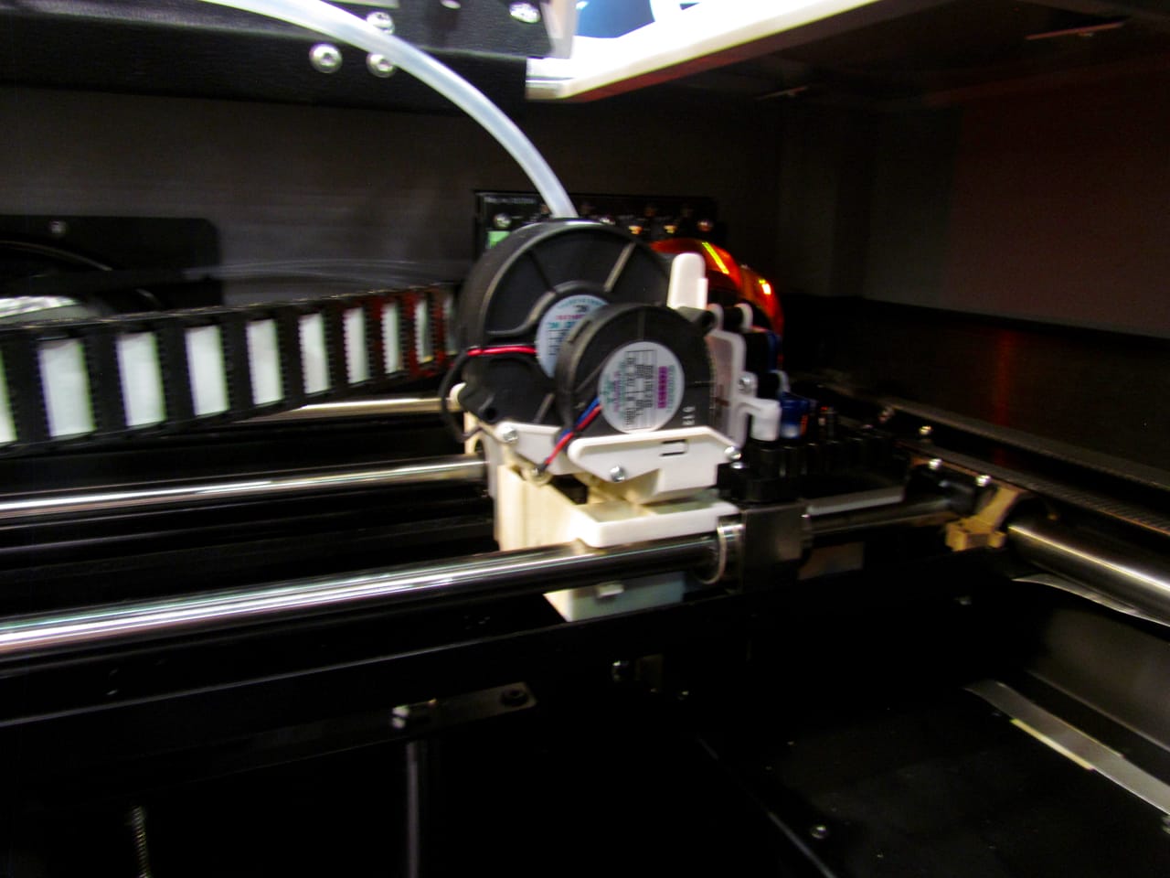  The Rize 3D print extruder, which includes both plastic and liquid deposition mechanisms 