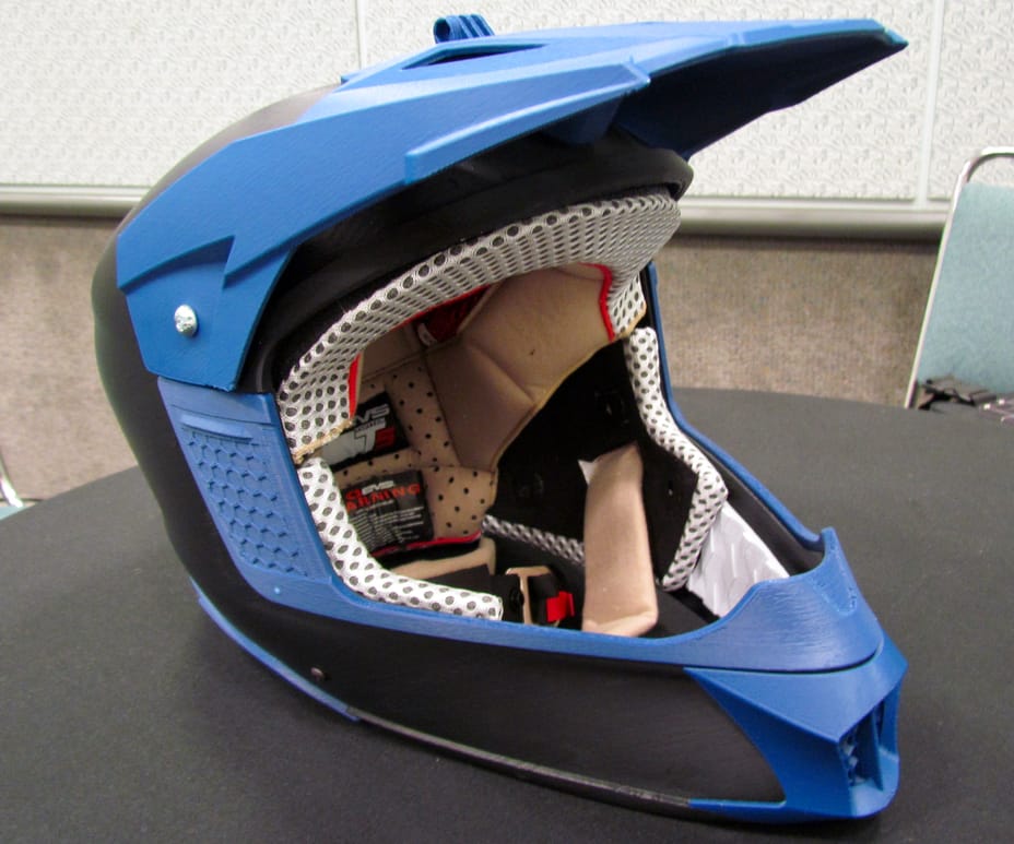  A prototype helmet produced by CADPD on the Stratasys F370 3D printer. Note screws were inserted without requiring any drilling 