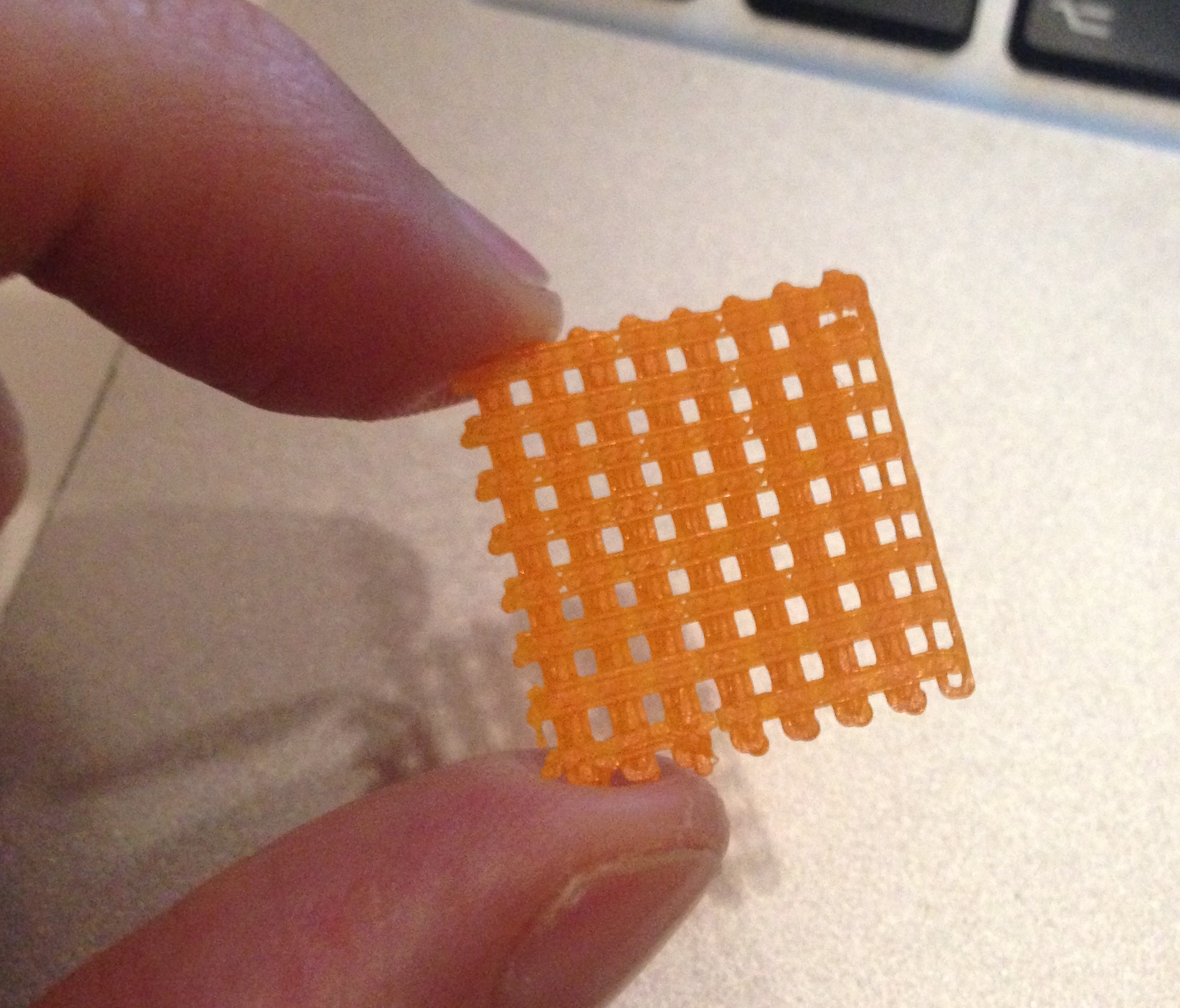  A design for reliably produced sub-millimeter holes for desktop 3D printing 