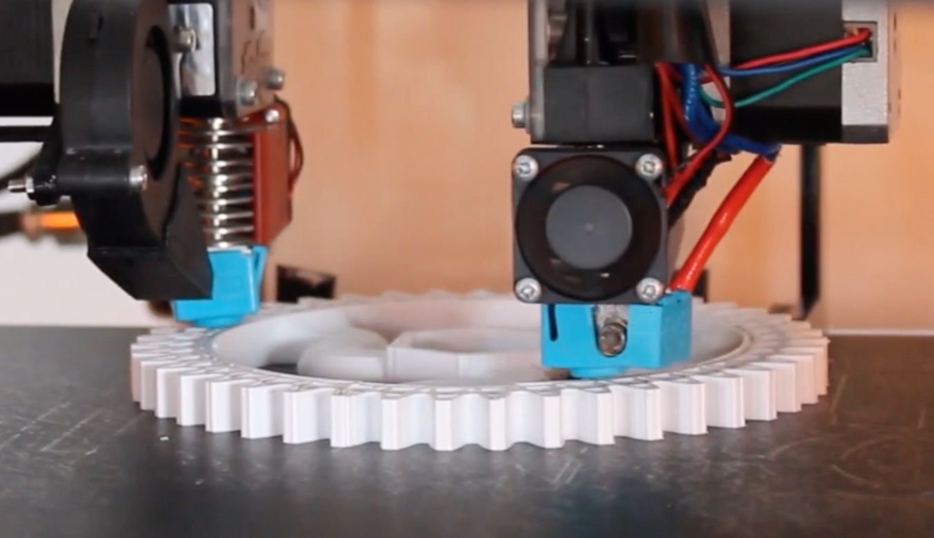  The dual independent extruders on the Modix Tango both working on a single object at the same time  