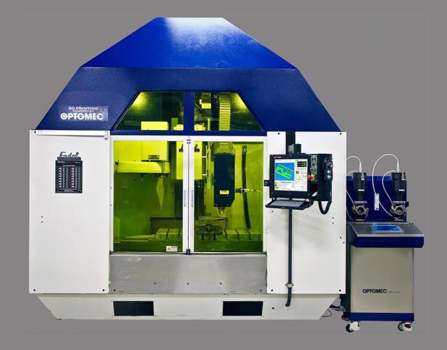  Optomec’s first hybrid additive and subtractive manufacturing system, based on a Fadal vertical mill. (Image courtesy of Optomec.) 