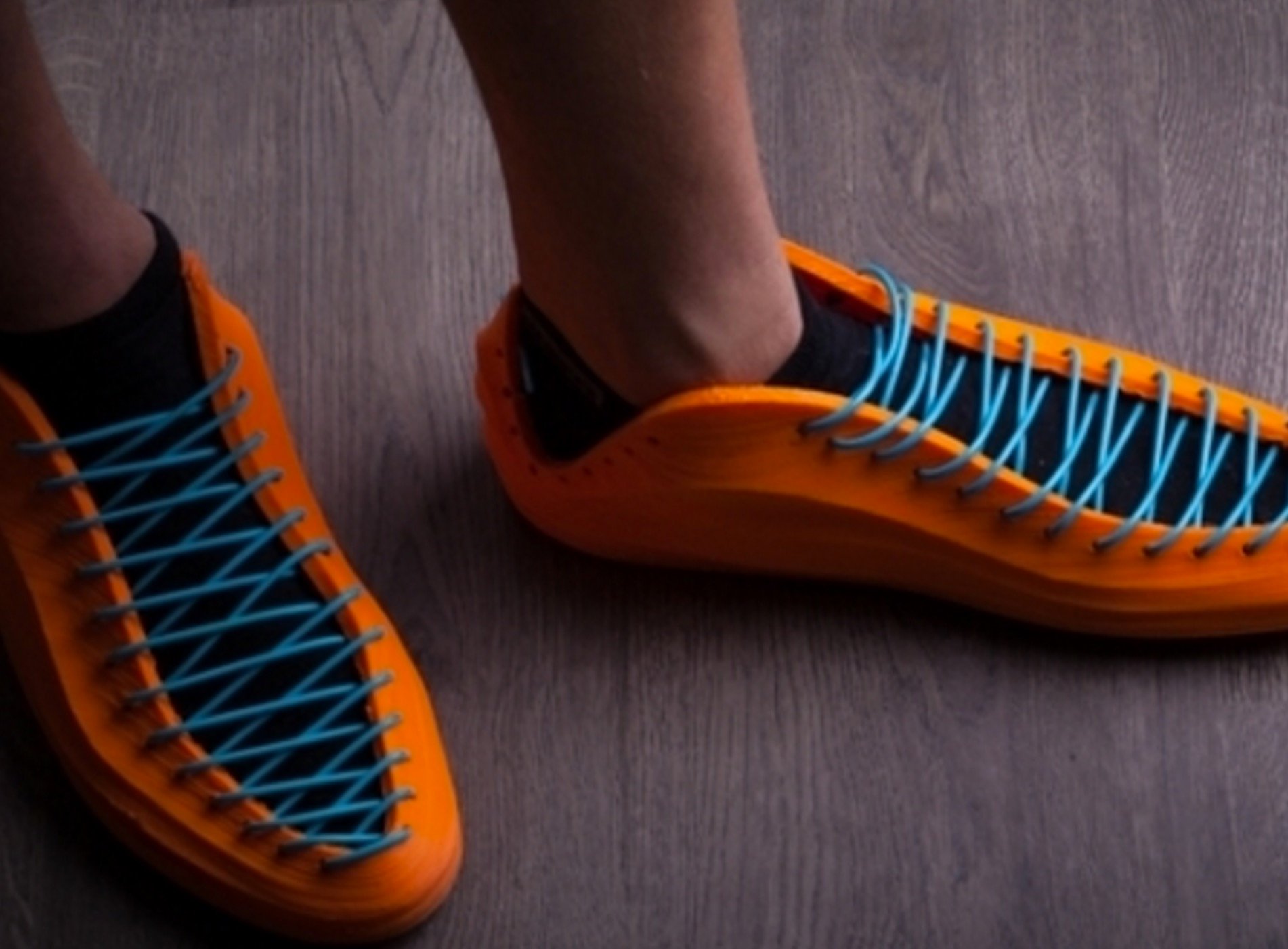 Wearing 3D printed shoes after lacing them up 