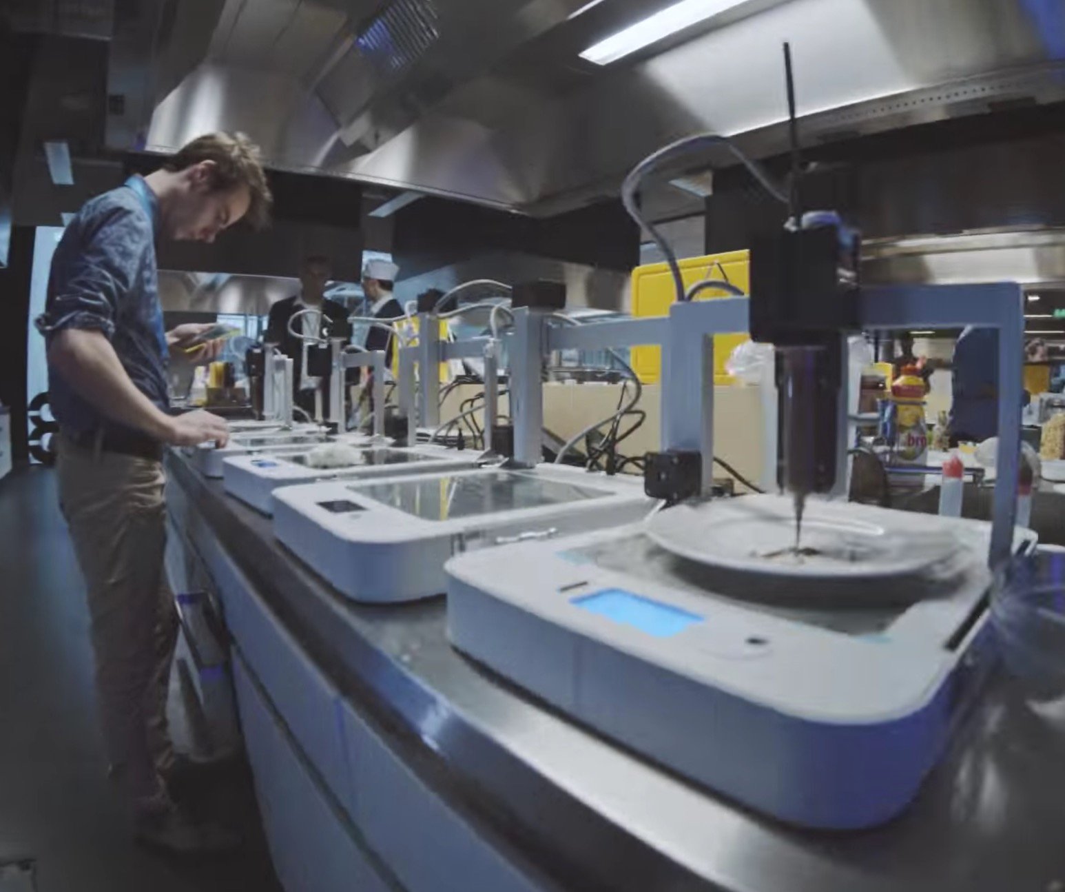 An array of 3D food printers in operation 