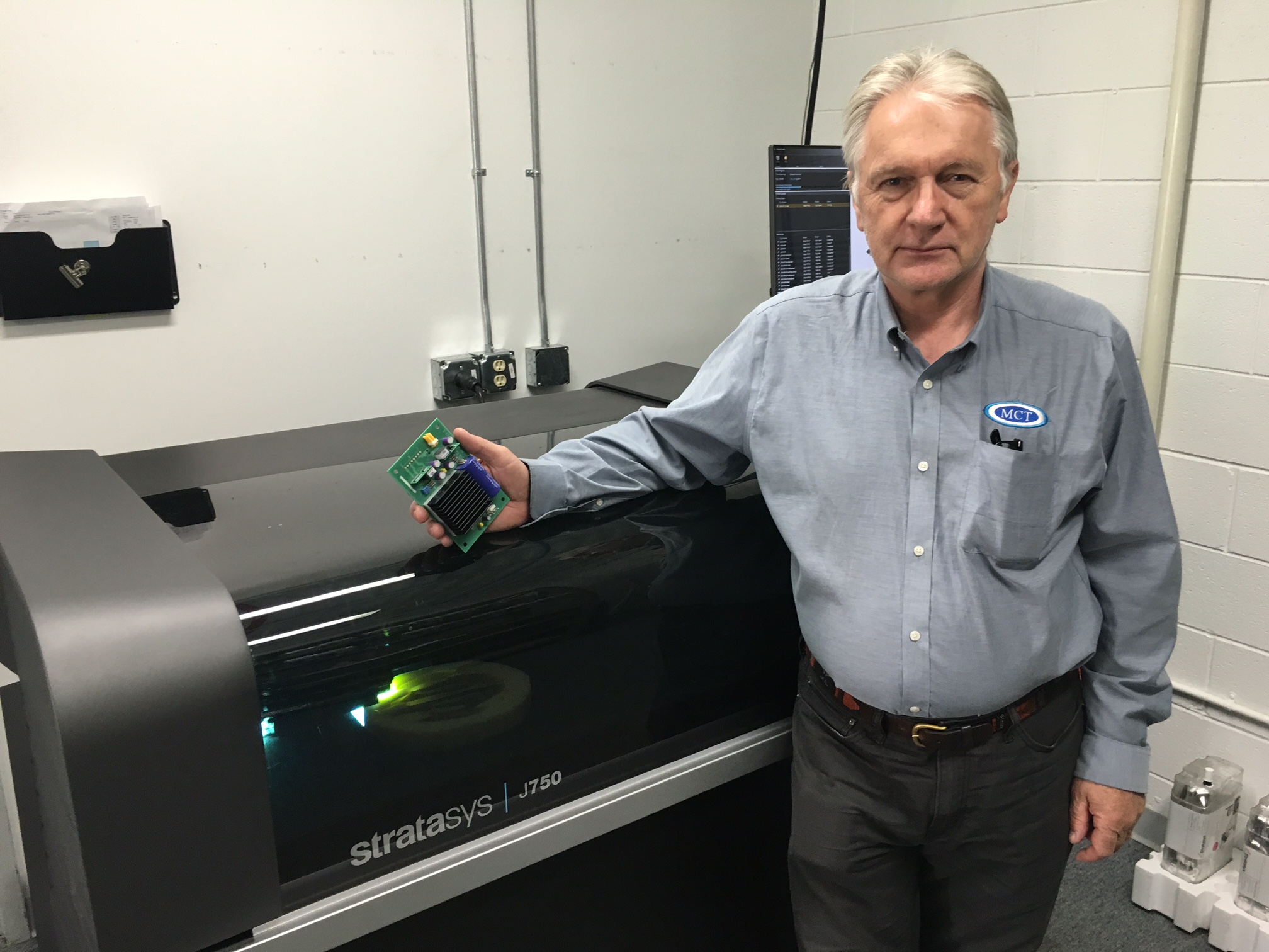  Midwest Composite Technologies' Helmut Keidel with his new Stratasys J750 full color 3D printer 