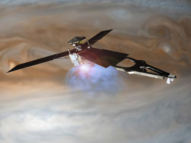  An illustration of the Juno spacecraft in orbit around Jupiter. (Image courtesy of Lockheed Martin.) 