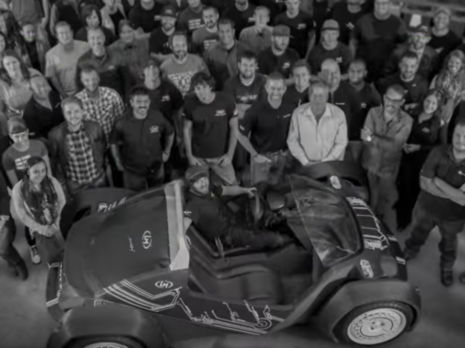  A crowd around Local Motors' LM3D 