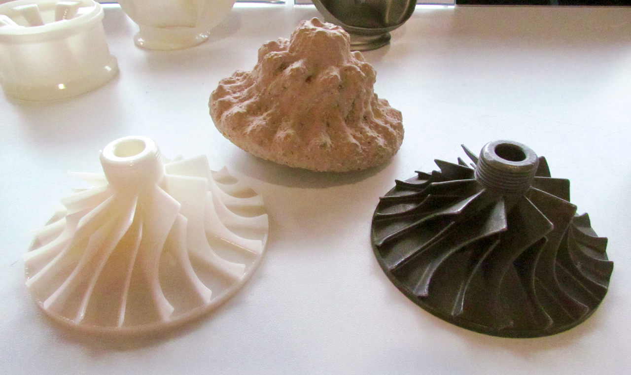  On the left, an object 3D printed in PolyCast; middle is the object encased in a casting medium; right is a solid cast metal object based on the original print 