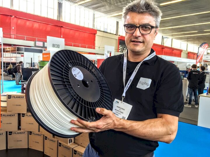BigRep founder, the late René Gurka, showing off some huge filament spools [Source: Fabbaloo]