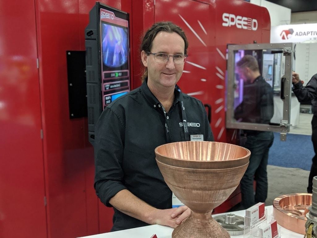  SPEE3D CEO Byron Kennedy with a 20kg copper rocket part [Image: Fabbaloo] 
