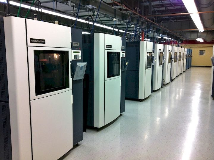  An array of production 3D printers at Stratasys [Source: Fabbaloo] 