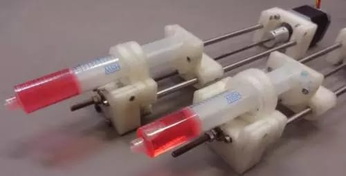  An open-source syringe pump, created to provide an example of the cost savings possible for research labs with open-source technology. (Image courtesy of Appropedia.) 