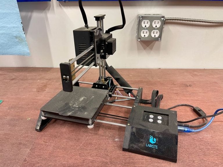 A Blast from the Past: Discovering an Ancient 3D Printer in a Modern Workshop